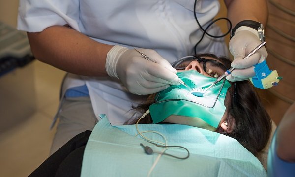 Dentist with patient